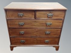 A 19th century mahogany and satinwood inlaid five drawer chest on bracket feet,