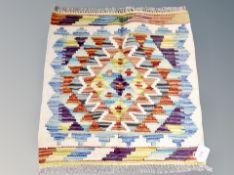 A Chobi kilim 48 cm x 48 cm