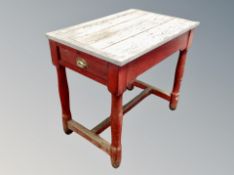 A painted limed oak WWII period War Office table on gun barrel legs,
