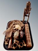 A group of ethnographic items, carved elephants, salad bowl, letter knife,