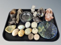 A group of polished eggs, onyx ashtray, Danish ceramic pig money banks,