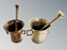 Two brass pestles and mortars