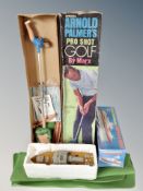 A boxed radio controlled torpedo boat together with an Arnold Palmer pro shot golf game by Marx