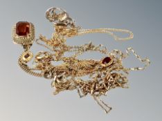 A pendant and chain etc