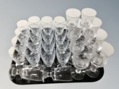 A quantity of Scandinavian drinking glasses