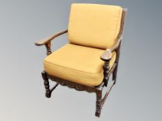 Two carved oak armchairs