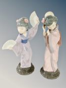 Two Lladro figures of geisha girls holding hand fans,
