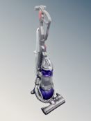 A Dyson DC25 upright vacuum cleaner