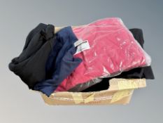 Thirty six men's polo shirts (large) and fourteen sweatshirts (medium)