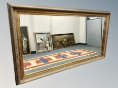 A good quality bevelled overmantel mirror, 226.5 cm x 126.