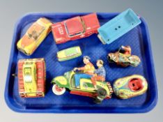A group of tin plate wind-up vehicles, Scooter, tank, motorbike,