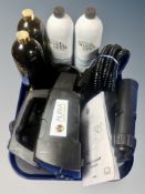 An Aura Innovations spray tan gun and related accessories