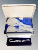 A single strand cultured pearl necklace with 9 ct gold clasp,