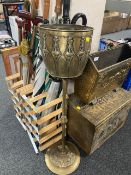 An Edwardian brass plant stand