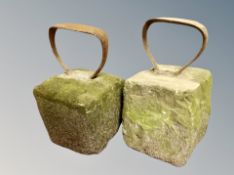 Two weathered stone and cast iron boot scrapers,