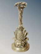 A Victorian brass pineapple door stop,