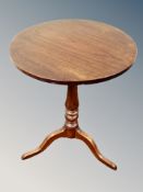 A Georgian style oak tripod table,