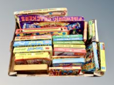 A box of vintage puzzles,