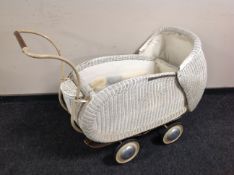 A 1920's Schmelaer cane pram