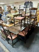 An oak pull out extending dining table,