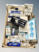 A box of cutlery, boxed silver plated napkin rings,