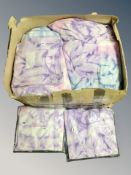 A box of tie-dye T-shirts