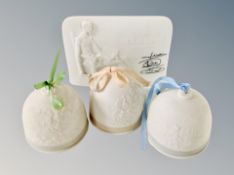 A Lladro Collector's Society plaque and three hand bells