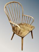 A stained beech spindle backed kitchen chair