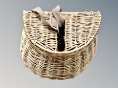 A wicker fishing creel,