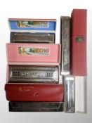 A group of Hohner mouth organs and further 'Flying Eagle' example