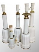 Five Danish gilt porcelain lamp bases,