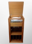 A G-Plan teak record cabinet containing an Ion USB turntable