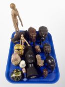 A group of carved wooden elephant ornaments, African bust,