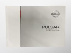 Ten Driver's Manuals/Owner Booklets in Original Wallets : 8 x Nissan (various models) and 2 x