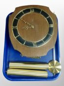 A Danish teak wall clock with pendulum and weights