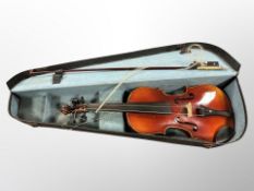 An early 20th century violin with two-piece 14