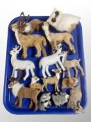 A group of Christmas reindeer decorations and similar soft toys