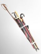 A bundle of walking sticks and umbrellas,