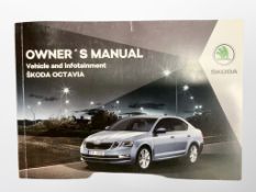 Ten Skoda Driver's Manuals/Owner Booklets in Original Wallets : 9 x Octavia and 1 x Karoq.