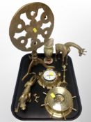 An ornate brass cased quartz timepiece together with a further ship's style barometer,