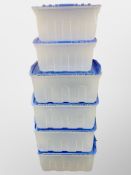 Six plastic storage boxes
