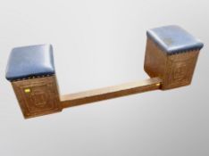 A copper and leather fire curb