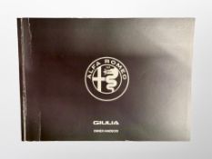 Ten Driver's Manuals/Owner Booklets in Original Wallets : 6 x MG, 3 x Alfa Romeo and 1 x SSangyong.