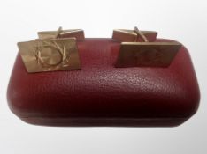 A pair of 9ct gold cufflinks CONDITION REPORT: 8.