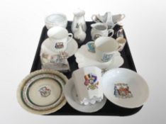 A group of crested porcelain including tea cups, saucers, jugs,