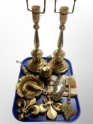 A pair of brass table lamps (continental wired), further brass ware, embossed dish,