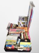 Two boxes containing jigsaws, Commando force remote control tank, various children's books, Rupert,