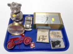 Two brass quartz time pieces together with a quantity of costume jewellery, cufflinks, model car,