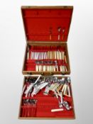 A 20th century teak canteen of cutlery