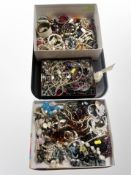 Three boxes of assorted costume jewellery, faux pearls, necklaces, chains,